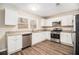 Modern kitchen with white cabinets and granite countertops at 195 Pinehurst Dr, Stockbridge, GA 30281