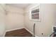 Laundry room with shelving and window at 195 Pinehurst Dr, Stockbridge, GA 30281