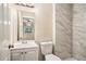 Clean bathroom with marble-tiled shower and vanity at 2791 Mcafee Rd, Decatur, GA 30032