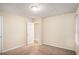 Well-lit bedroom with carpet and an exterior door at 2791 Mcafee Rd, Decatur, GA 30032