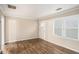 Living room with hardwood floors and a view to the front yard at 2791 Mcafee Rd, Decatur, GA 30032