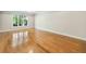 Large bedroom with hardwood floors and a window at 53 Paces West Dr, Atlanta, GA 30327