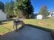 Spacious backyard with patio and garden at 6090 Kingston Ln, Mcdonough, GA 30253