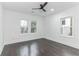 Spacious bedroom with hardwood floors and ceiling fan at 1064 Westmoor Dr, Atlanta, GA 30314