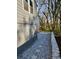 Side yard with gravel pathway and stone wall at 1064 Westmoor Dr, Atlanta, GA 30314