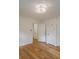 Spacious bedroom with hardwood floors, ample closet space, and a ceiling light fixture at 1098 Jefferson Ave, Atlanta, GA 30344