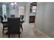 Charming dining room with a rustic table and access to kitchen at 5479 Dorsett Shoals Rd, Douglasville, GA 30135