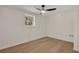 Finished basement bedroom with ceiling fan and window at 4717 Clemmons Drive, Ellenwood, GA 30294