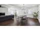 Open dining area with dark hardwood floors at 912 Ira Sw St, Atlanta, GA 30310