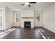 Living Room with fireplace and hardwood floors at 3564 Arrow Root Cir, Loganville, GA 30052