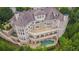 Luxury home with pool and expansive patio, offering stunning views at 1055 Leadenhall St, Alpharetta, GA 30022