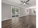 Open dining area with sliding glass doors and ceiling fan at 1971 Westley Dr, Riverdale, GA 30296