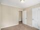 Simple bedroom with neutral walls and carpet at 1742 Lynn Ln, Decatur, GA 30032