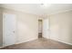 Bright bedroom with neutral walls and carpet at 1742 Lynn Ln, Decatur, GA 30032
