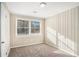 Bright bedroom with wainscoting and carpet at 1742 Lynn Ln, Decatur, GA 30032