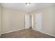 Spacious bedroom with neutral walls and carpet at 1742 Lynn Ln, Decatur, GA 30032