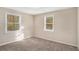 Well-lit bedroom with neutral walls and carpet at 1742 Lynn Ln, Decatur, GA 30032
