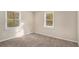 Bright bedroom with neutral walls and carpet at 1742 Lynn Ln, Decatur, GA 30032