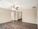 Living room with hardwood floors and ceiling fan at 1742 Lynn Ln, Decatur, GA 30032