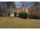 Two-story brick house with attached garage at 3061 Stone Bridge Sw Trl, Conyers, GA 30094