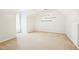 Bedroom with neutral carpet, floating shelves, and vaulted ceiling at 3315 Goldmist Dr, Buford, GA 30519