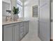 Bathroom with gray vanity and marble countertop at 210 Rolison Way, Fayetteville, GA 30214