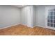 Basement room with gray walls, flooring, and closet at 6841 Fairway Ridge, Douglasville, GA 30134