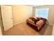 Bright bedroom with carpet and large window at 1291 Vienna Ct, Hampton, GA 30228