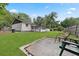 Large backyard, partially fenced, with patio and shed at 1396 Iron Gate Blvd, Jonesboro, GA 30238