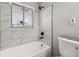 Updated bathroom with bathtub, shower, and stylish tile at 1396 Iron Gate Blvd, Jonesboro, GA 30238