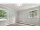 Bright bedroom with neutral walls, new carpet, and ample closet space at 1396 Iron Gate Blvd, Jonesboro, GA 30238
