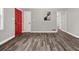 Entryway with red door and hardwood floors at 1396 Iron Gate Blvd, Jonesboro, GA 30238
