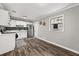 Modern white kitchen with stainless steel appliances at 1396 Iron Gate Blvd, Jonesboro, GA 30238