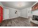 Bright living room with hardwood floors, fireplace and a red front door at 1396 Iron Gate Blvd, Jonesboro, GA 30238
