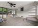 Bright screened porch with ceiling fan and access to backyard at 1396 Iron Gate Blvd, Jonesboro, GA 30238