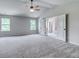 Main bedroom with en-suite bathroom and ceiling fan at 301 Delta Dr, Mcdonough, GA 30252