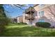 Building exterior showcasing balconies and landscaping at 3950 Stillwater Dr, Duluth, GA 30096