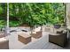 Relaxing deck with fire pit and outdoor kitchen area at 663 Carriage Nw Way, Atlanta, GA 30327