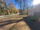 Landscaped backyard with wooded area view at 2785 Battle Forrest Dr, Decatur, GA 30034