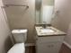 Bathroom with granite countertop vanity and new toilet at 2785 Battle Forrest Dr, Decatur, GA 30034