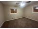 Bright bedroom featuring ceiling fan and carpet at 2785 Battle Forrest Dr, Decatur, GA 30034