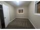 Bedroom with neutral wall paint, carpeting, and closet at 2785 Battle Forrest Dr, Decatur, GA 30034