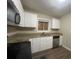 Full view of kitchen with granite countertops and stainless steel appliances at 2785 Battle Forrest Dr, Decatur, GA 30034