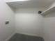Clean laundry area with shelving and floor at 2785 Battle Forrest Dr, Decatur, GA 30034