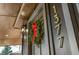 Close-up of a front door with gold house numbers and a holiday wreath at 1377 Dorothy Dr, Decatur, GA 30030