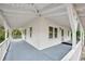Spacious front porch with white railings, offering a relaxing outdoor space at 2259 Whites Mill Rd, Decatur, GA 30032