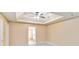 Empty bedroom with a ceiling fan, and a doorway leading to another room at 3775 Trillium Wood Trl, Snellville, GA 30039