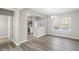 Dining area with wood-look floors and kitchen access at 5667 Cascade Sw Run, Atlanta, GA 30336