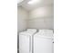 Convenient laundry room with washer and dryer at 5667 Cascade Sw Run, Atlanta, GA 30336