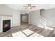 Living room with fireplace, wood-look floors, and neutral walls at 5667 Cascade Sw Run, Atlanta, GA 30336